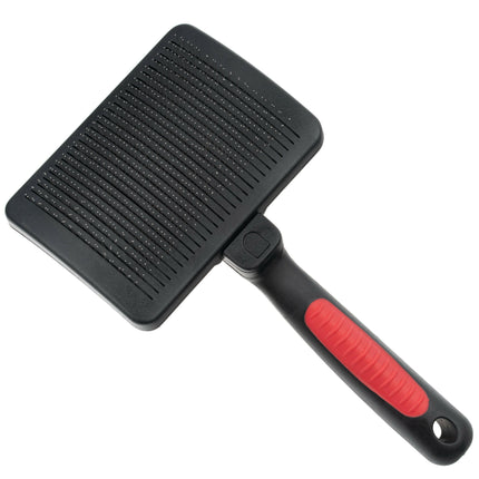 Ideal Dog self-cleaning poodle brush for dogs.