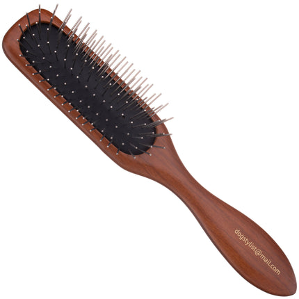 P&W Dog Stylist Brush - wooden, elongated brush with metal pins.