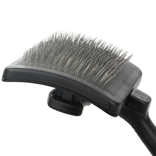 Ideal Dog self-cleaning poodle brush for dogs.