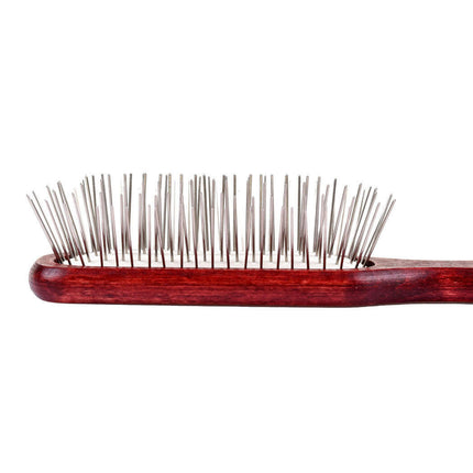 Blovi Wood Pin Brush - elongated wooden brush with a metal pin.