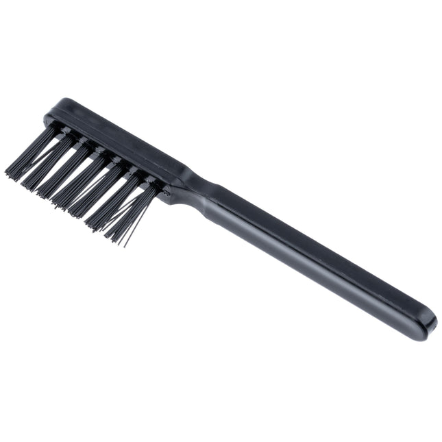 Moser - handy brush for cleaning clippers and blades.