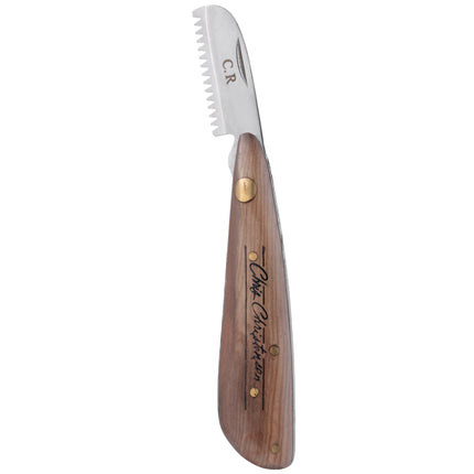 Chris Christensen Folding Stripping Knife - professional trimmer with a wooden folding handle.