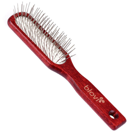 Blovi Wood Pin Brush - elongated wooden brush with a metal pin.